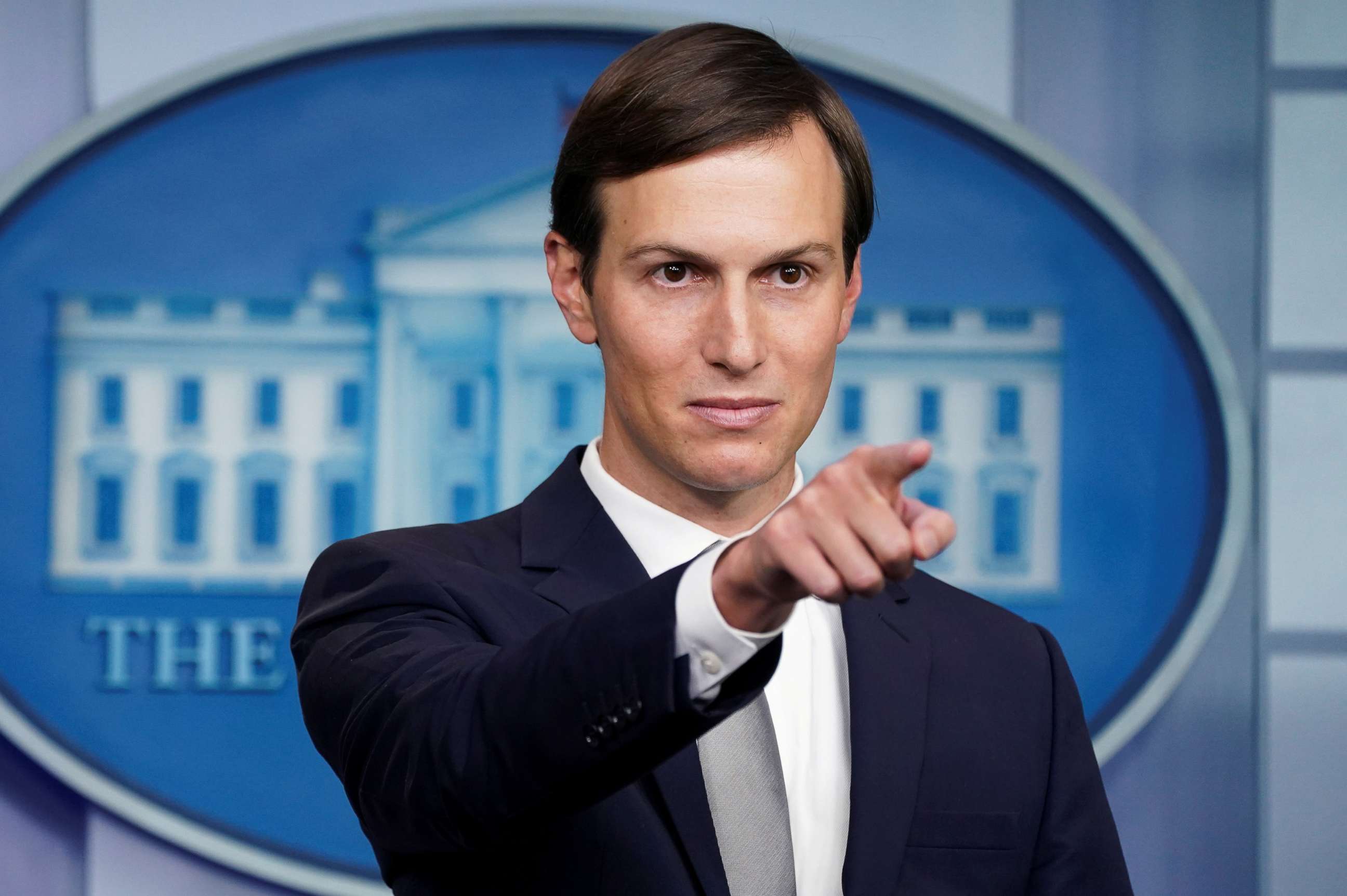 PHOTO: White House adviser Jared Kushner points during a press briefing at the White House in Washington, Aug. 13, 2020. 