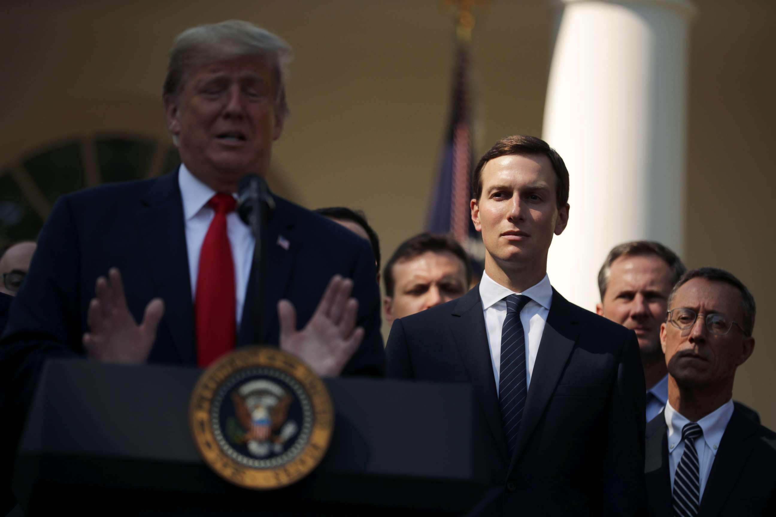 PHOTO: White House senior adviser Jared Kushner, center, listens as President Donald Trump speaks during a press conference in the Rose Garden of the White House, Oct. 1, 2018.