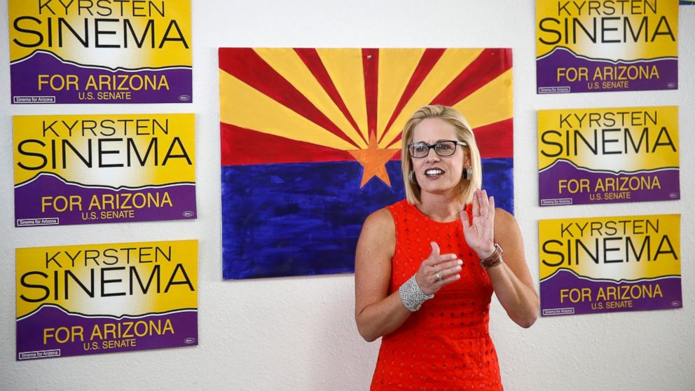 PHOTO: In this Aug. 28, 2018, file photo, Rep. Kyrsten Sinema, D-Ariz., talks to campaign volunteers at a Democratic campaign office in Phoenix.