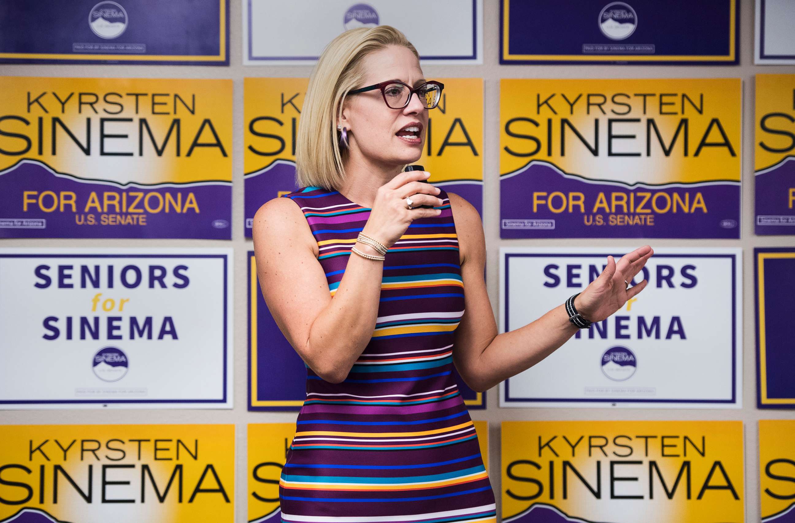 PHOTO: Rep. Kyrsten Sinema speaks to supporters at the United Food and Commercial Workers union in Phoenix, Ariz., Oct. 21, 2018.