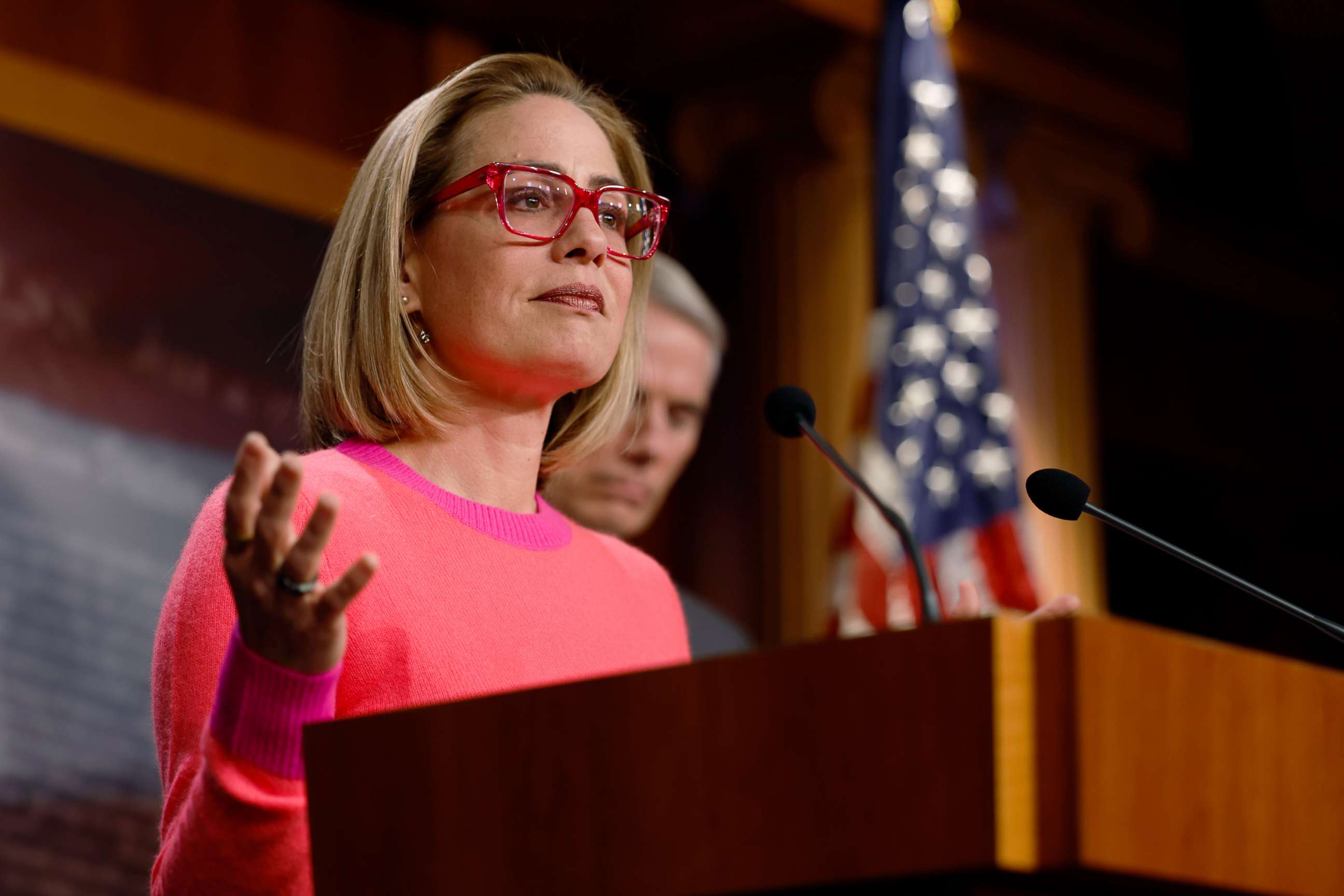 PHOTO: Sen. Kyrtsen Sinema (D-AZ) speaks at a news conference after the Senate passed the Marriage Equality Act at the Capitol Building on Nov. 29, 2022 in Washington, DC. 