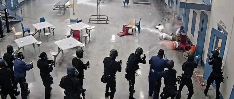 PHOTO: LPCC staff firing pepper spray and chemical agents at detainees in an LPCC
housing area on April 13, 2020. 