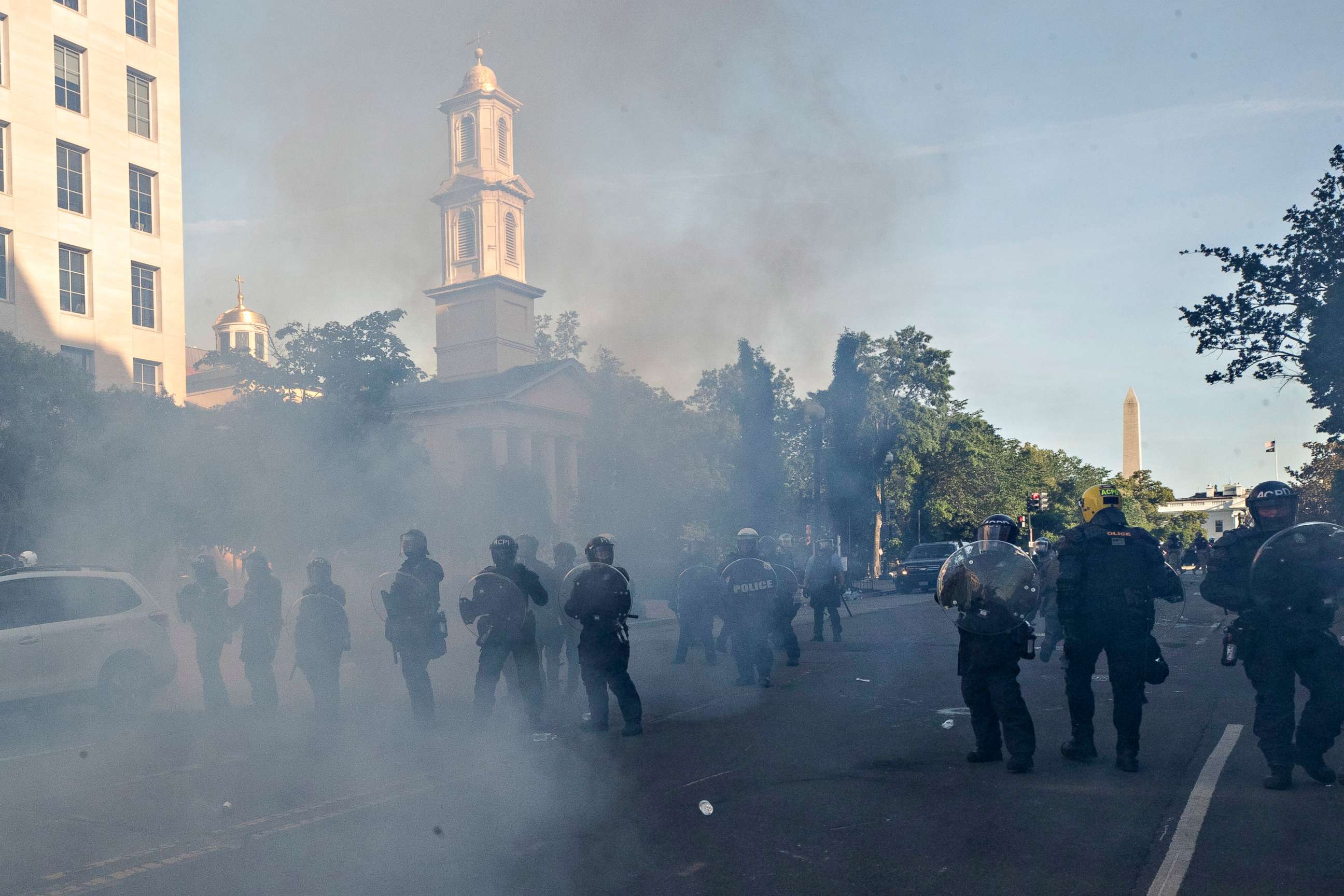 PHOTO: A line of police move demonstrators away from St. John's Church across Lafayette Park from the White House, June 1, 2020, in Washington.