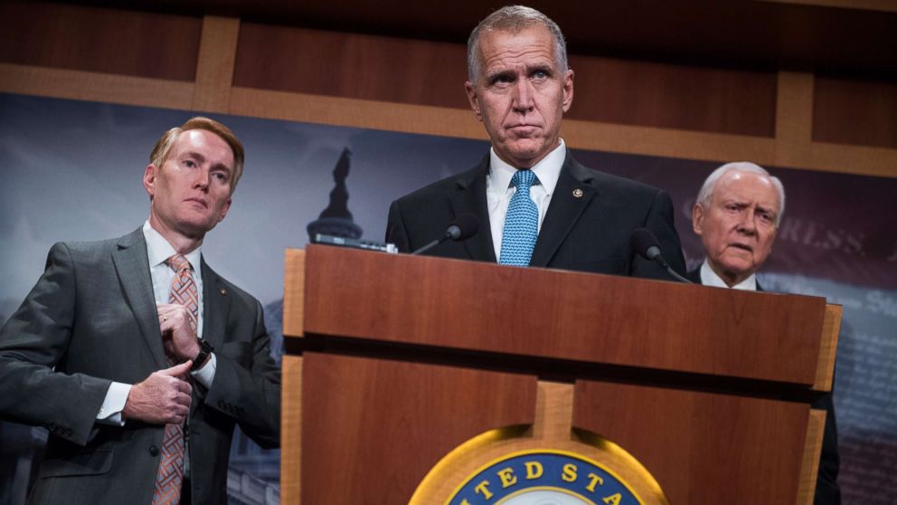 From left, Sens. James Lankford, R-Okla., Thom Tillis, R-N.C., and Orrin Hatch, R-Utah, hold a news conference in the Capitol on the Succeed Act, which would create a pathway to citizenship for undocumented immigrants on Sept. 25, 2017.