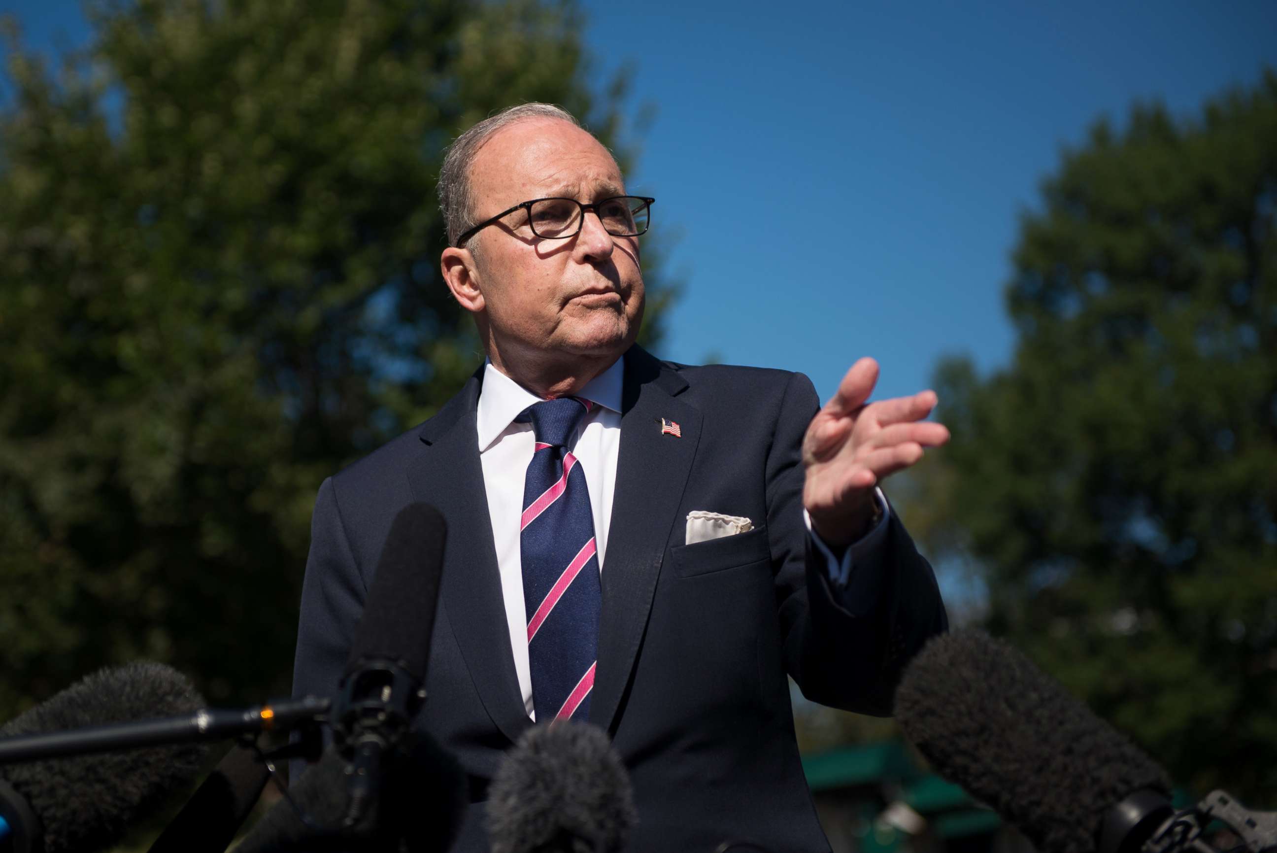 PHOTO: White House National Economic Advisor Larry Kudlow speaks with members of the press outside the White House in Washington, Oct. 12, 2018. 