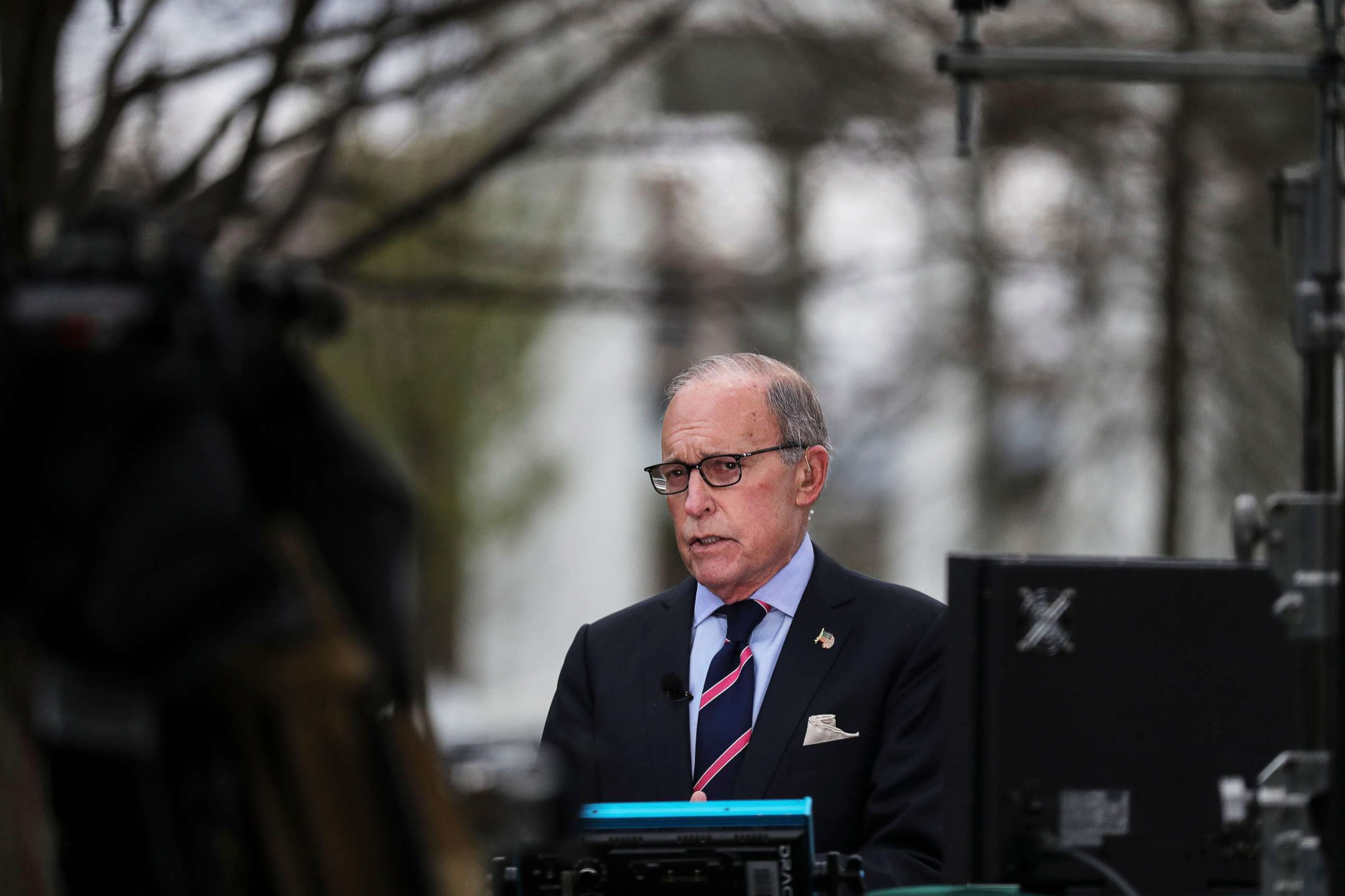 PHOTO: Director of the United States National Economic Council Larry Kudlow participates in a TV interview at the White House, in Washington, March 24, 2020.