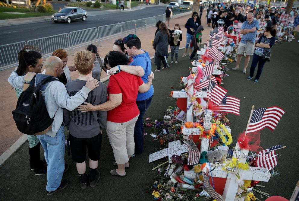 PHOTO: People pray at a makeshift memorial for victims of a mass shooting in Las Vegas, Oct. 9, 2017.