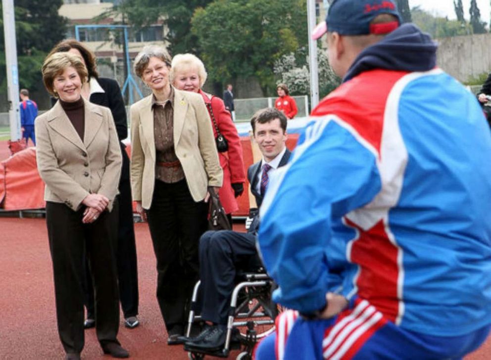 PHOTO: Mrs. Laura Bush visits with members of the Russian Paralympic Team Sunday, April 6, 2008, during a visit to Central Sochi Stadium in Sochi, Russia. Standing with her is her interpreter, Marina Gross.