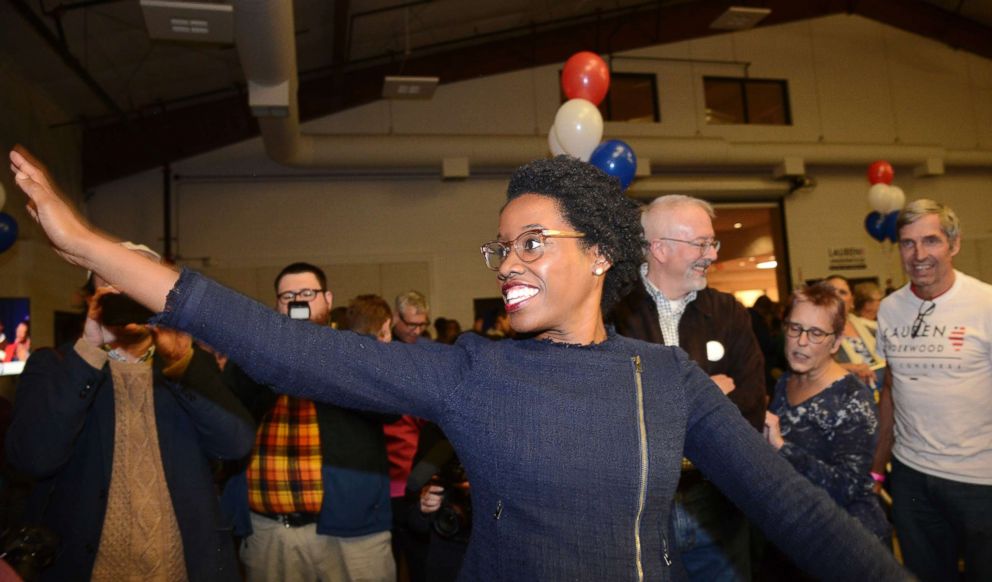 PHOTO:Lauren Underwood, the Democratic candidate in Illinois' 14th District, visits with others at her election night party in St. Charles, Ill., Nov. 6, 2018.
