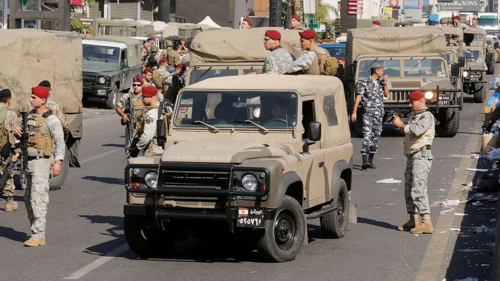PHOTO: Lebanese army soldiers deploy in an attempt to open a road blocked by demonstrators during ongoing anti-government protests in Zouk Mosbeh, Lebanon Nov. 5, 2019.
