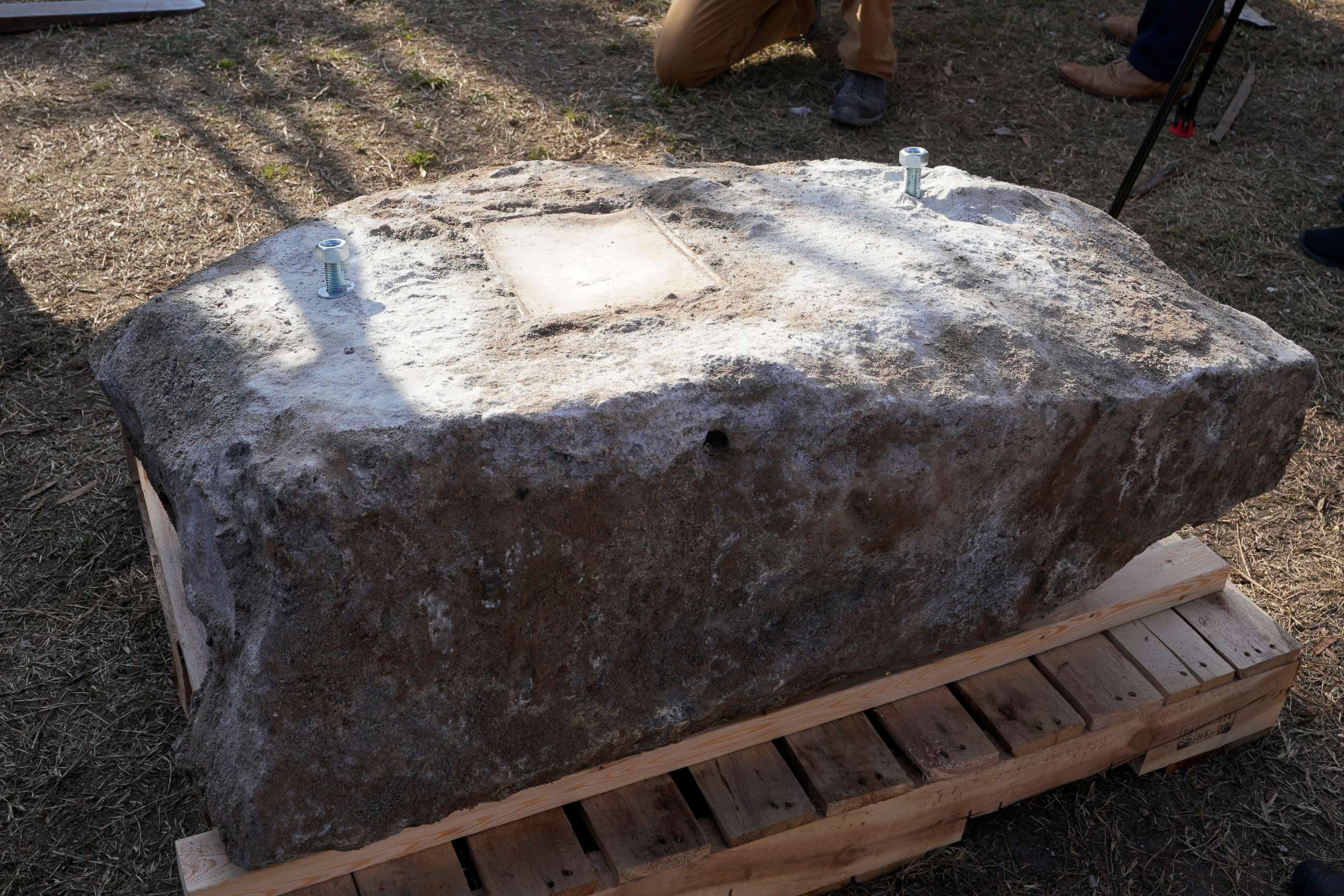 PHOTO: A stone containing a time capsule that was placed in 1887 in the pedestal that once held the statue of Confederate General Robert E. Lee was placed on a pallet on Monument Avenue, Dec. 17, 2021, in Richmond, Va.