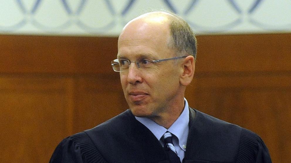 PHOTO: In this June 22, 2012, file photo, Judge Leo T. Sorokin passes out diplomas at a ceremony in Boston.