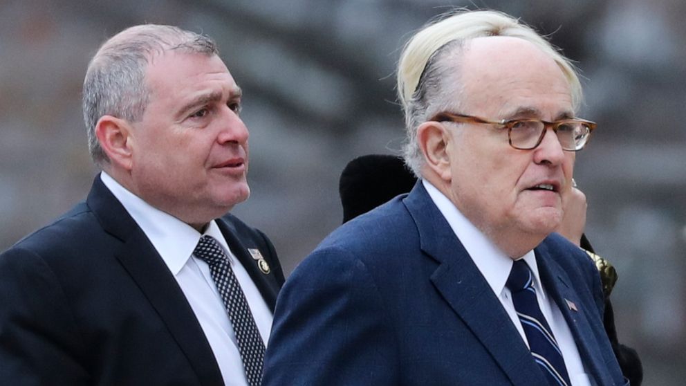 PHOTO: Rudy Giuliani, right, and Soviet born businessman who served as Giuliani's fixer in Ukraine, Lev Parnas, left, arrive for the funeral of former president George H.W. Bush at the National Cathedral in Washington on Dec. 5, 2018.