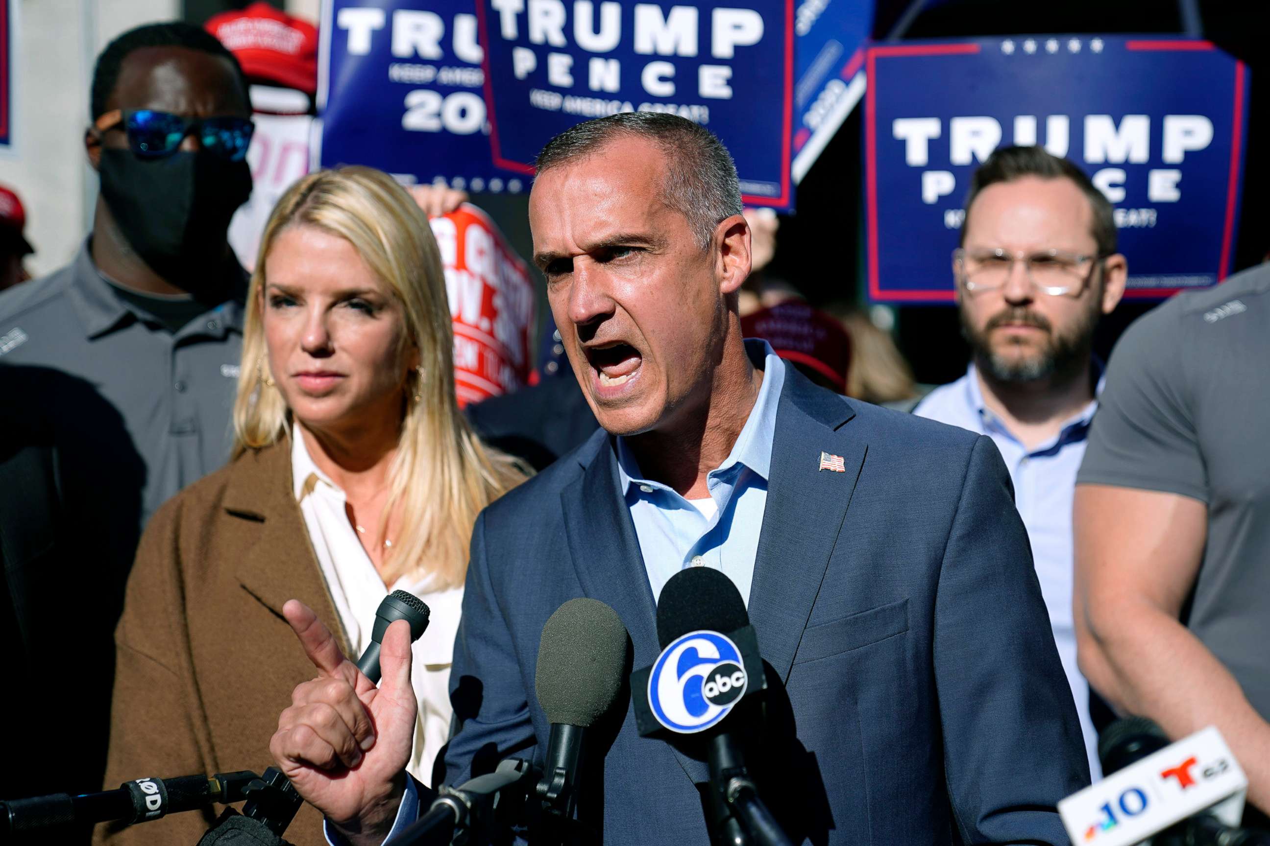 PHOTO: President Donald Trump's campaign advisor Corey Lewandowski, center, speaks outside the Pennsylvania Convention Center where votes are being counted, Nov. 5, 2020, in Philadelphia, following Tuesday's election.