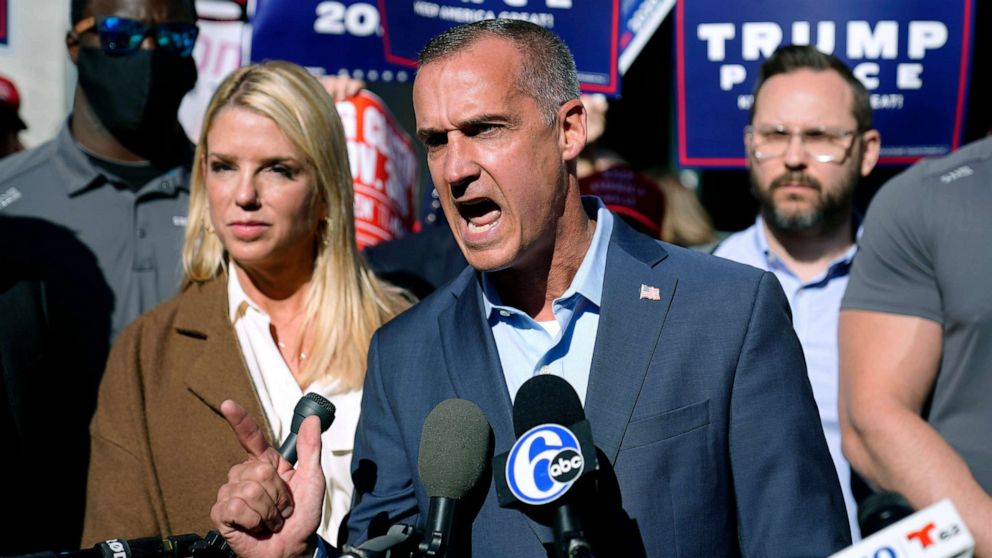 PHOTO: President Donald Trump's campaign advisor Corey Lewandowski, center, speaks outside the Pennsylvania Convention Center where votes are being counted, Nov. 5, 2020, in Philadelphia, following Tuesday's election.