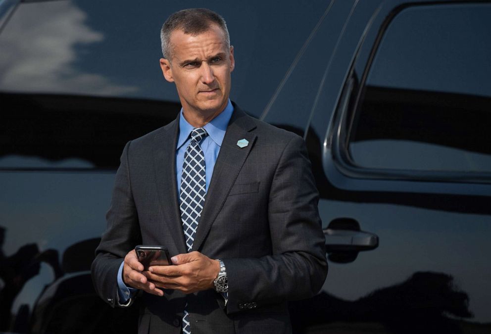 PHOTO: Corey Lewandowski, former campaign manager for President Donald Trump, watches as Trump disembarks from Air Force One upon arrival at Cincinnati/Northern Kentucky International Airport in Hebron, Ky., Aug. 1, 2019, for a campaign rally.