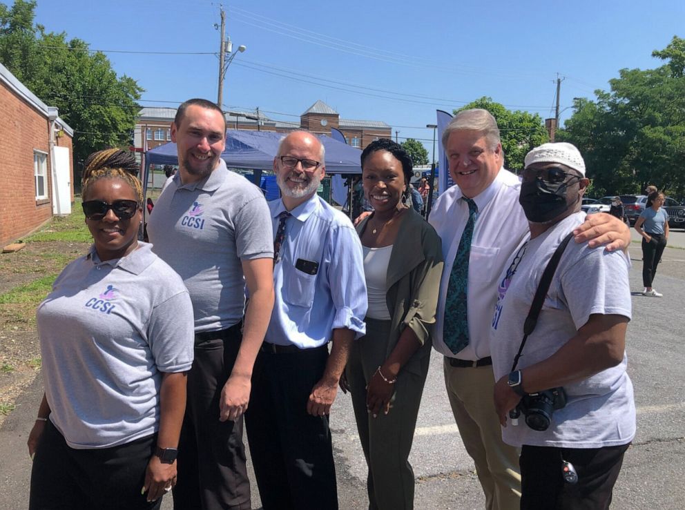 PHOTO: Leadership at Community Crisis Services in Hyattsville, Md., gather after a press conference on the implementation of the new National Suicide Prevention Lifeline number, 988, on July 12, 2022.