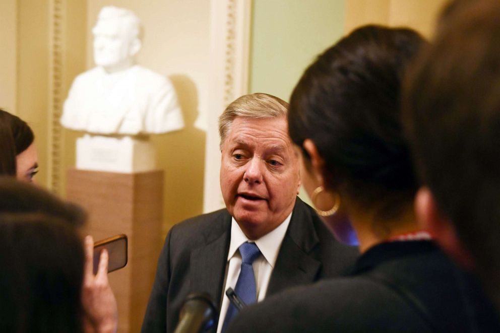 PHOTO: Sen. Lindsey Graham speaks to the press after the Senate voted against subpoenaing new witnesses and documents during the impeachment proceedings against the president on Jan. 31, 2020, in Washington.