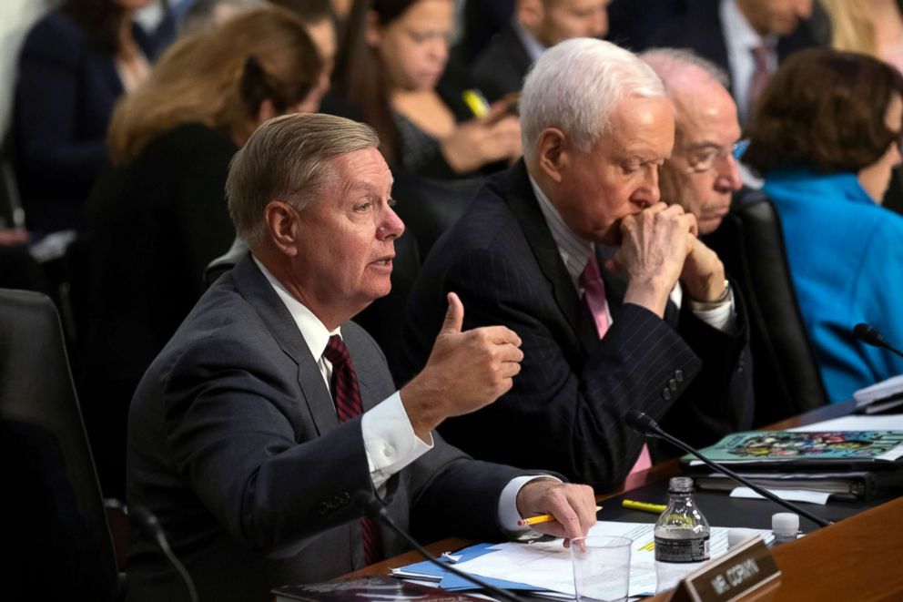 PHOTO: Sen. Lindsey Graham, joined by Sen. Orrin Hatch and Senate Judiciary Committee Chairman Chuck Grassley, questions Supreme Court nominee Brett Kavanaugh during the second day of his confirmation hearing, on Capitol Hill in Washington, Sept. 5, 2018.