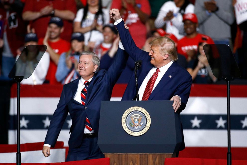 PHOTO: In this Feb. 28, 2020, file photo, Sen. Lindsey Graham stands onstage with President Donald Trump during a campaign rally in North Charleston, S.C.