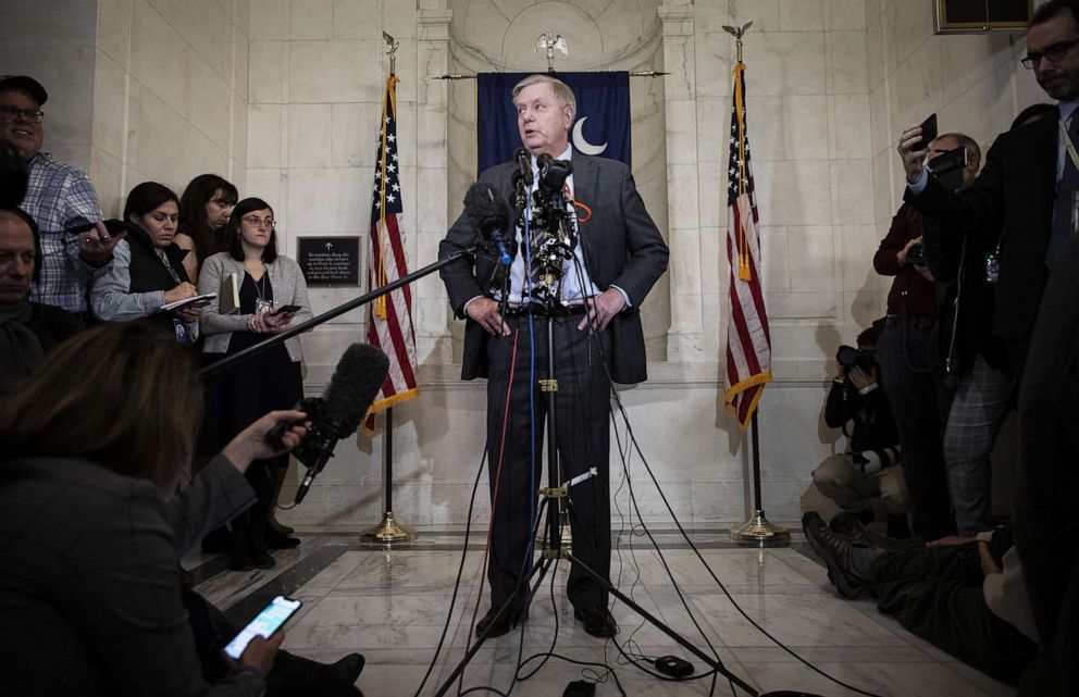 PHOTO: Sen. Lindsey Graham speaks to reporters outside of his office at the U.S. Capitol, Dec. 18, 2019 in Washington, D.C.