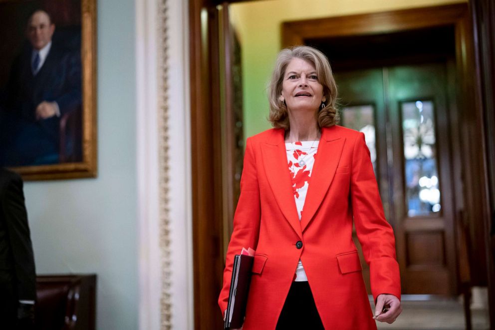 PHOTO: In this April 5, 2022, file photo, Sen. Lisa Murkowski smiles as she leaves the Senate chamber, at the Capitol in Washington, D.C.