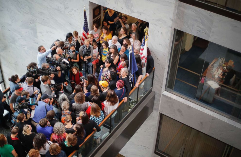 PHOTO: Demonstrators gather outside the Senate office of Sen. Lisa Murkowski on Capitol Hill in Washington, Oct. 4, 2018.