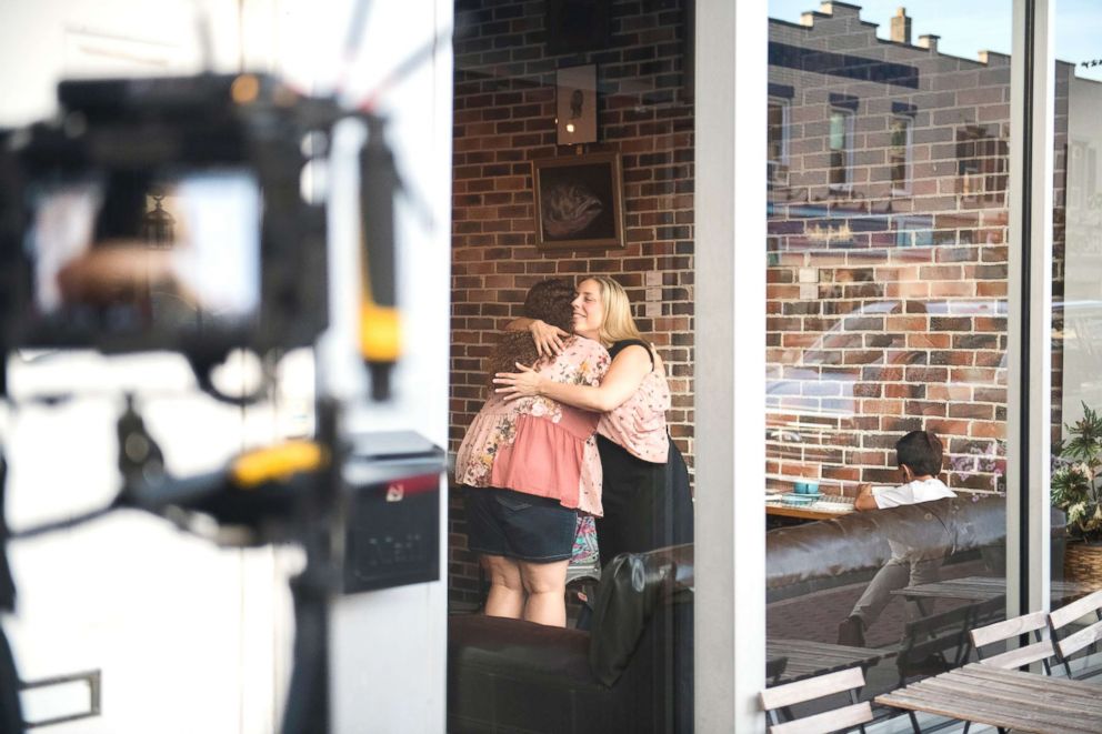 PHOTO: Congressional candidate Liuba Grechen Shirley hugs a supporter while filming an campaign ad on July 24, 2018, at a local coffee shop.