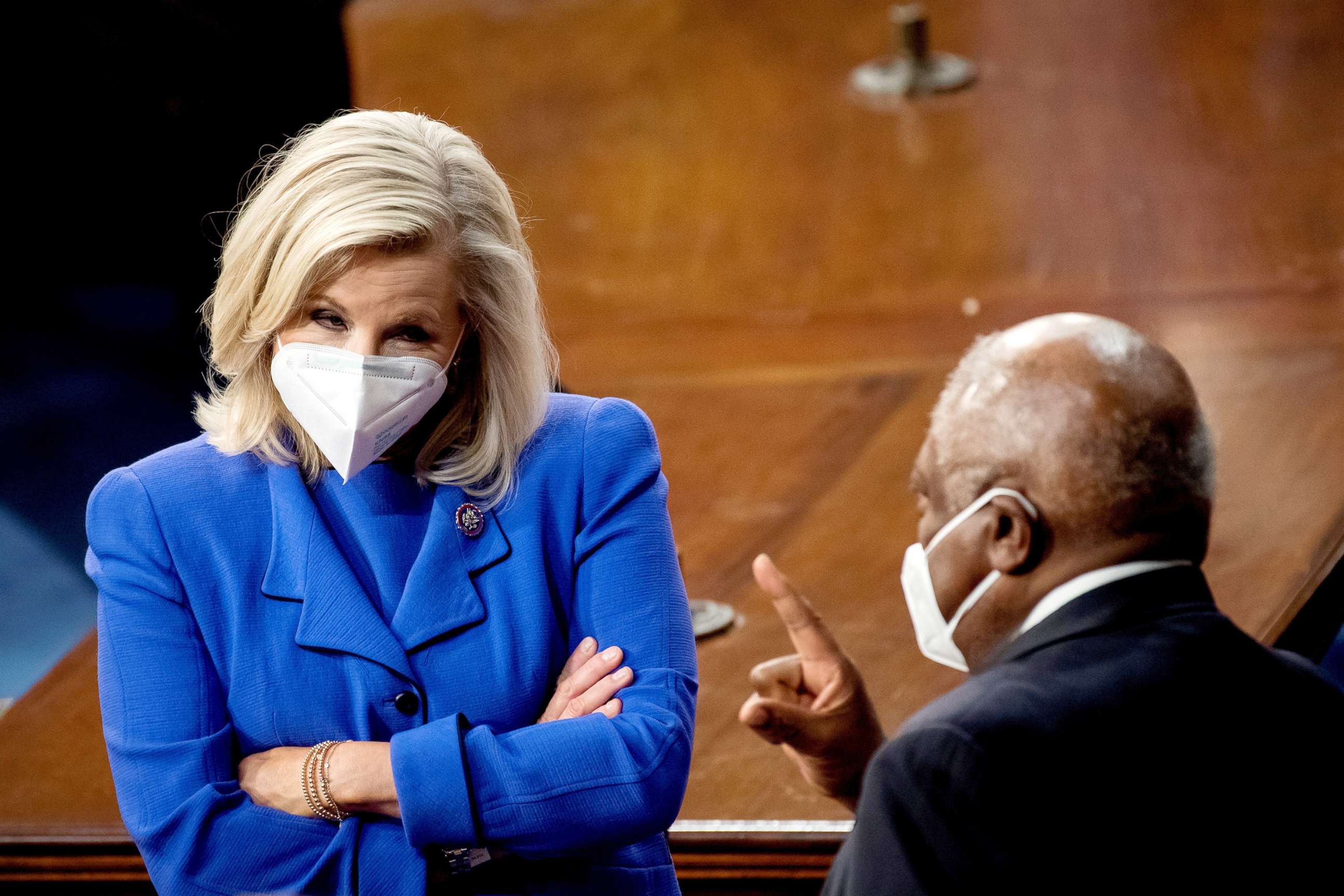 PHOTO: Republican Conference Chair Liz Cheney and House Majority Whip Jim Clyburn talk before the start of President Joe Biden's address to the joint session of Congress at the Capitol, April 28, 2021.