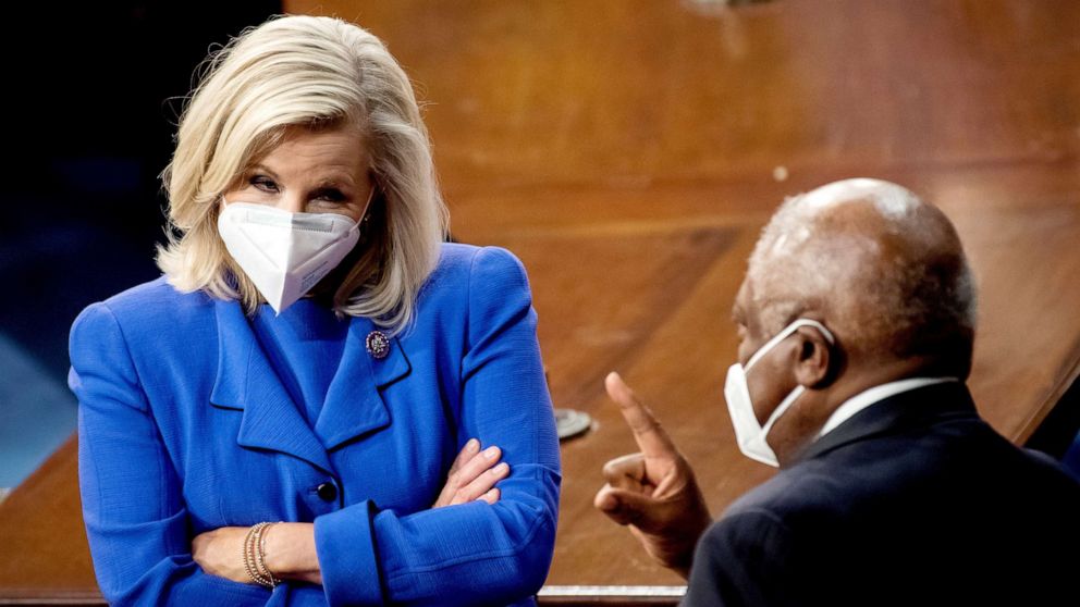 PHOTO: Republican Conference Chair Liz Cheney and House Majority Whip Jim Clyburn talk before the start of President Joe Biden's address to the joint session of Congress at the Capitol, April 28, 2021.