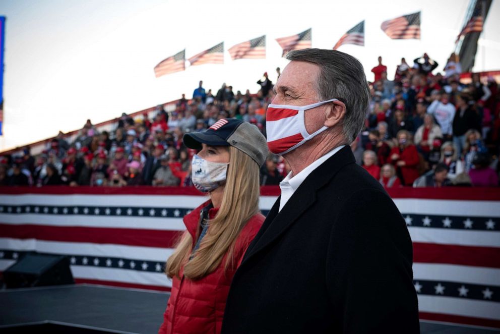 PHOTO: Republican Senators Kelly Loeffler and David Perdue attend a rally in Valdosta, Georgia, Dec. 5, 2021.