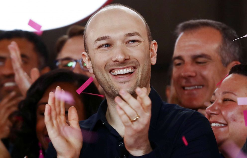 PHOTO: Lyft CEO Logan Green and others applaud at the Nasdaq opening bell ceremony celebrating Lyft's initial public offering on March 29, 2019, in Los Angeles.