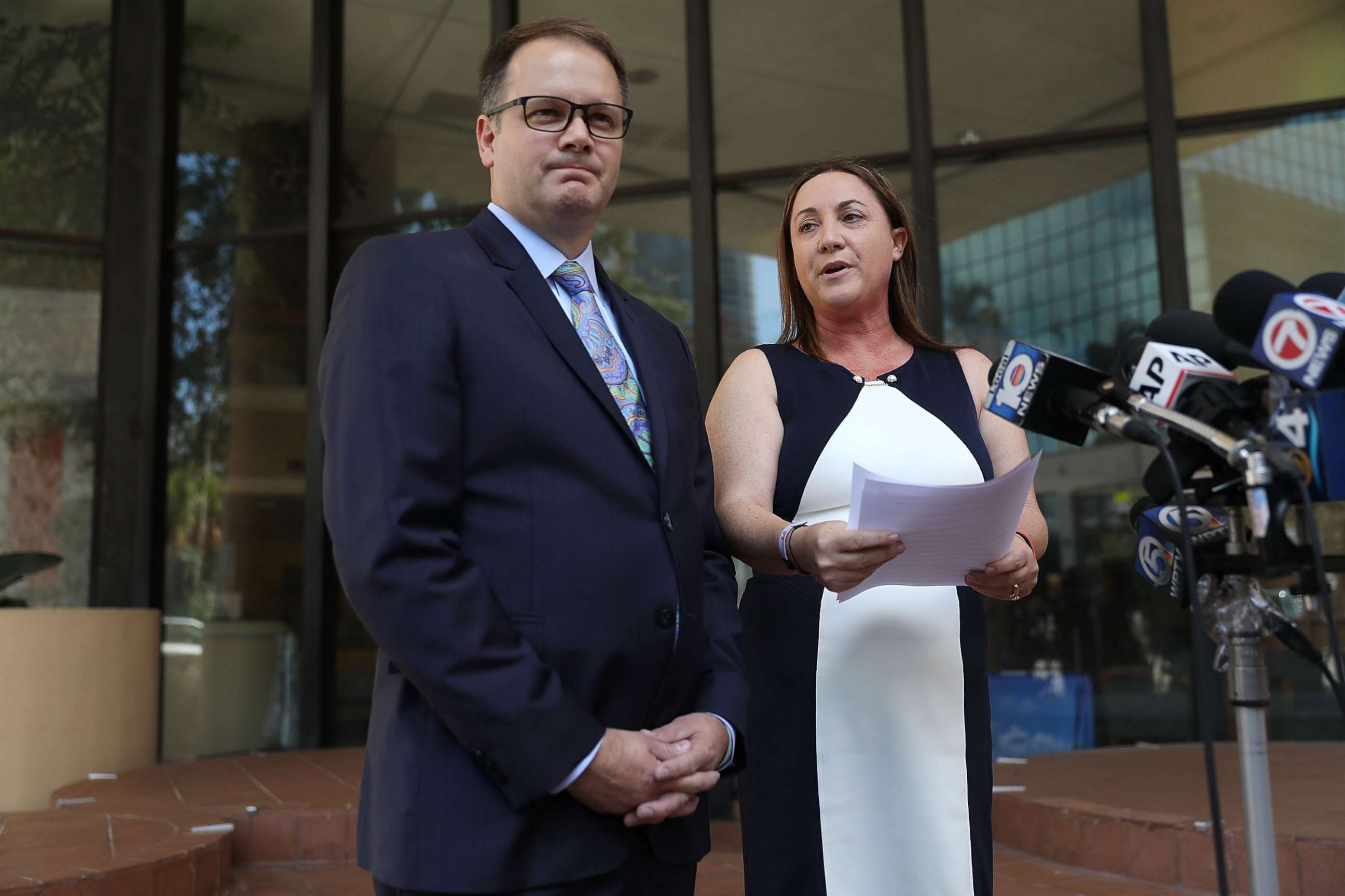 PHOTO: Ryan Petty and Lori Alhadeff speak to the media after turning in their paperwork to run for the Broward County School Board, May 15, 2018, in Fort Lauderdale, Fla.