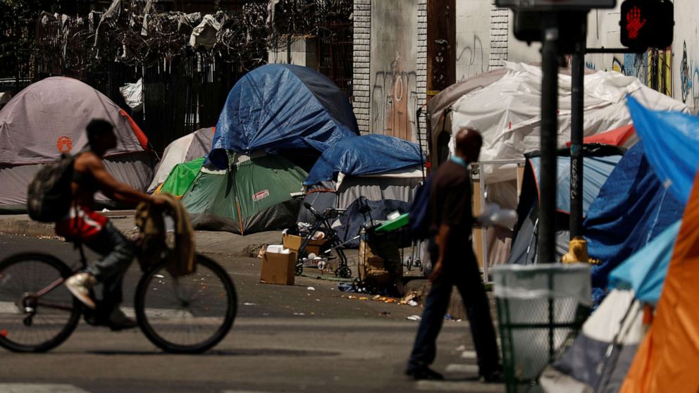 PHOTO: Tents and tarps erected by homeless people are shown along sidewalks and streets in the skid row area of downtown Los Angeles, June 28, 2019.