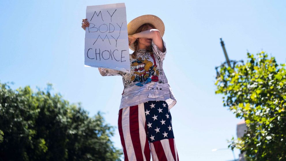 PHOTO: Abortion-rights advocate Eleanor Wells, 34, wipes her tears during a protest in Los Angeles, on June 24, 2022.