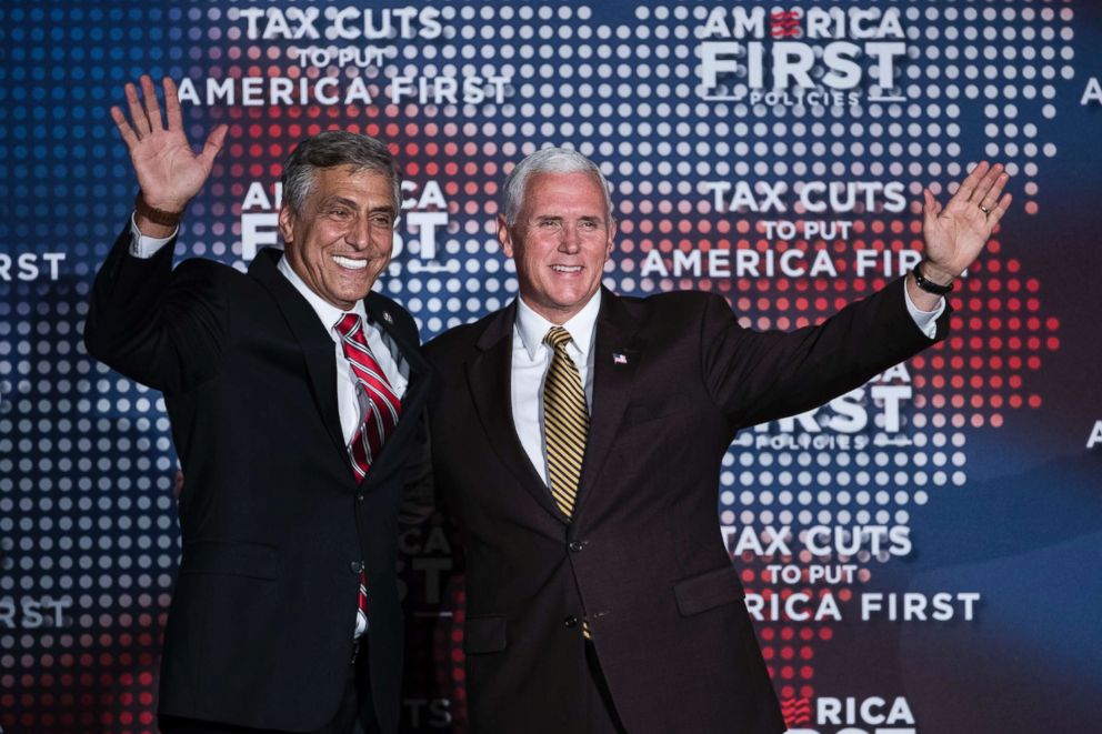 PHOTO: Rep. Lou Barletta and Vice President Mike Pence wave to audience members at an America First Policies event in Philadelphia, July 23, 2018.