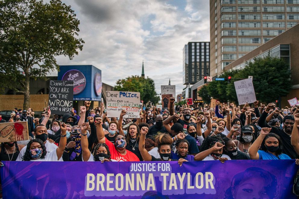 PHOTO: Protestors march in the street during a demonstration on Sept. 23, 2020, in Louisville, Ky.