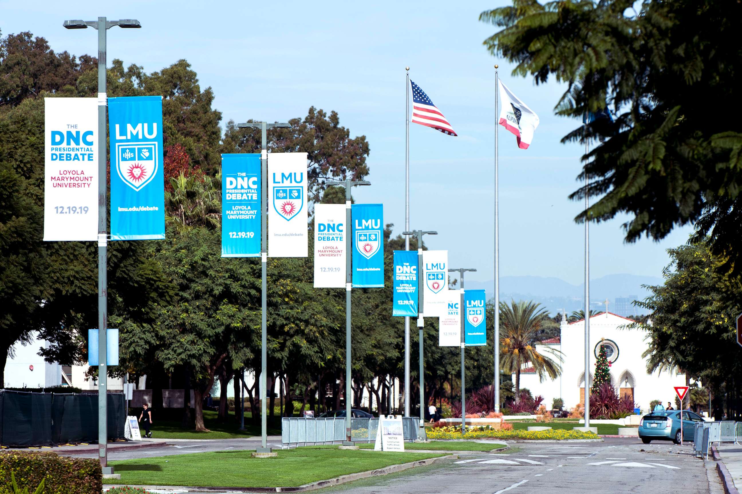 PHOTO: Signage for the sixth Democratic presidential candidates' debate on, co-sponsored by PBS NewsHour and POLITICO and held at Loyola Marymount University's Gersten Pavilion, is seen posted on the campus, Dec. 11, 2019.