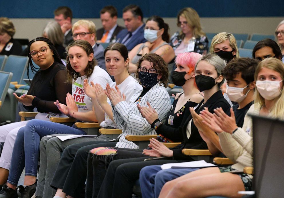 PHOTO: Lyman High School students, and students from other Seminole County, Florida, high schools, applaud remarks supporting their position during a meeting of the Seminole County School Board on May 10, 2022 in Florida.