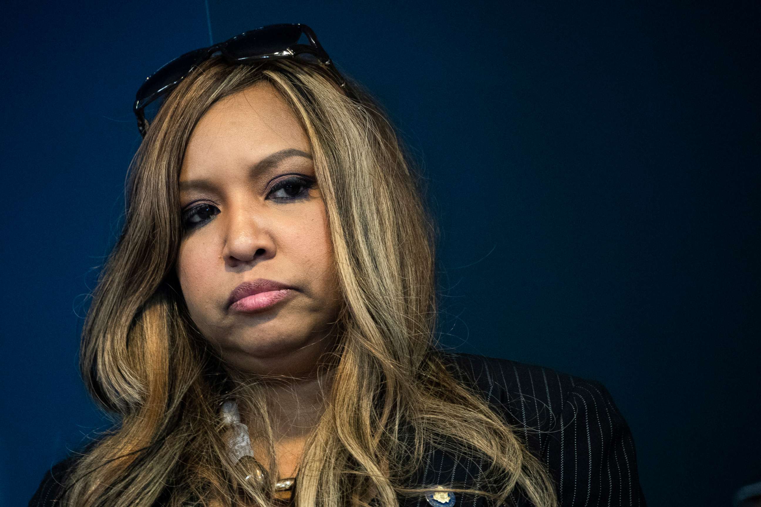 PHOTO: Lynne Patton, event planner and Head of Region II for HUD, listens during a press conference at the Jacob Javits Federal Building, Jan. 31, 2019, in New York.