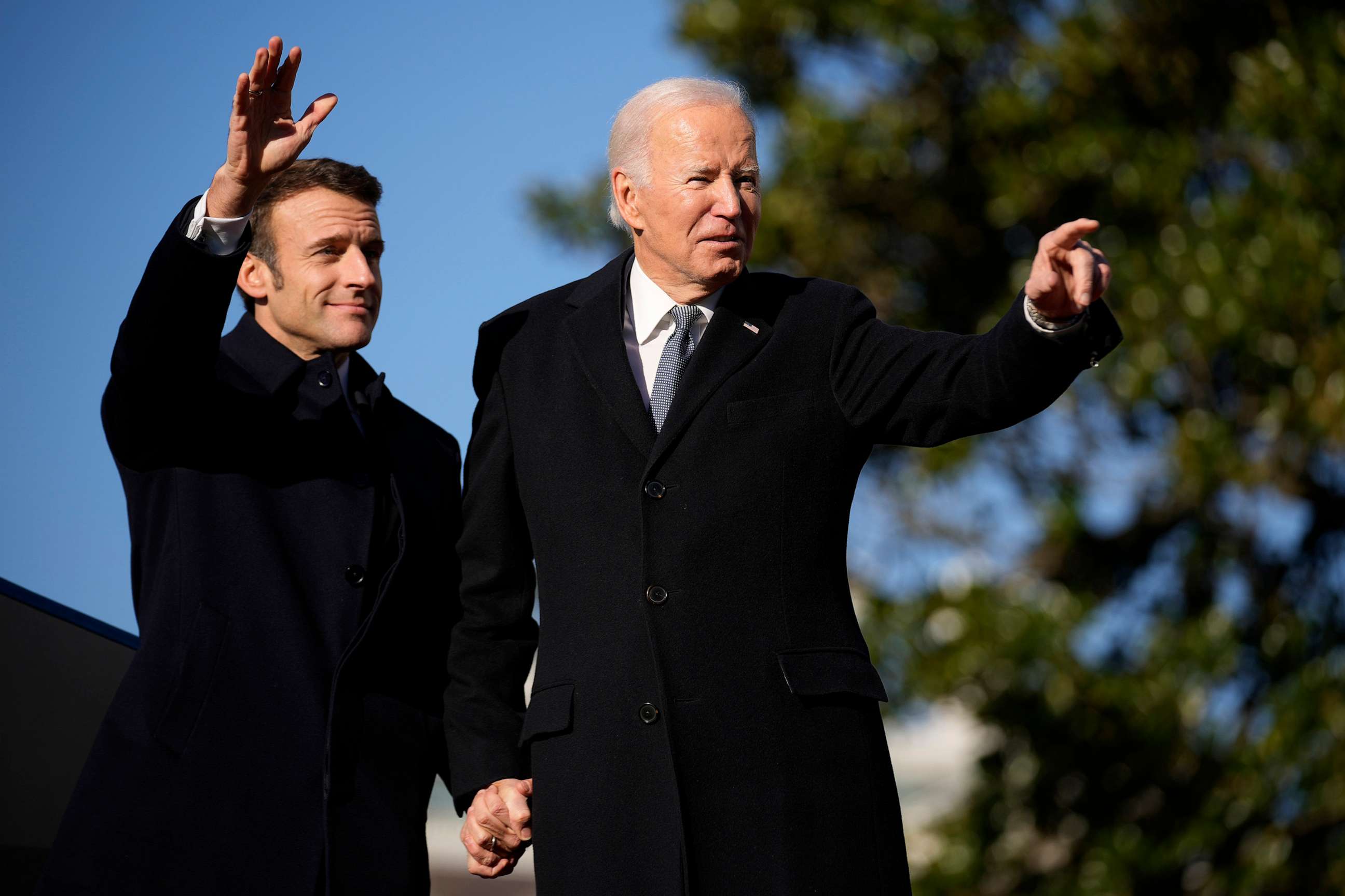 PHOTO: French President Emmanuel Macron and President Joe Biden stand on the stage during a State Arrival Ceremony on the South Lawn of the White House in Washington, Dec. 1, 2022.