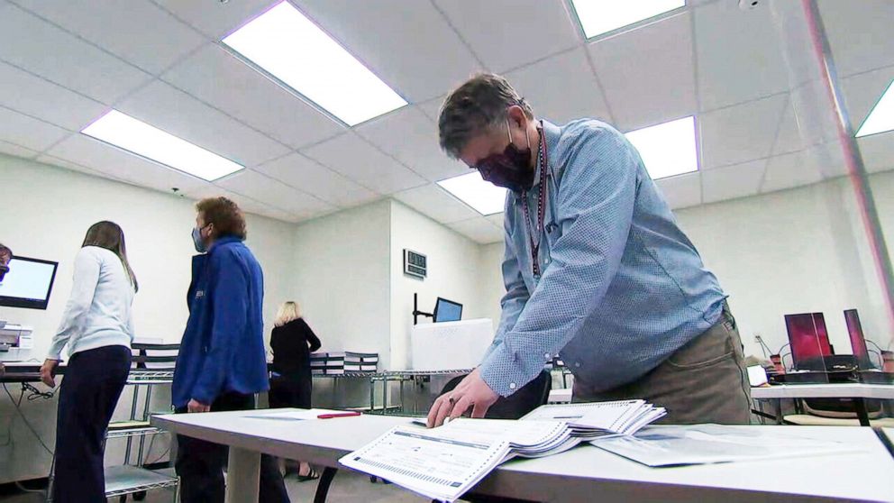 PHOTO: Election officials test ballot counting machines to make sure everything works ahead of November 3rd election