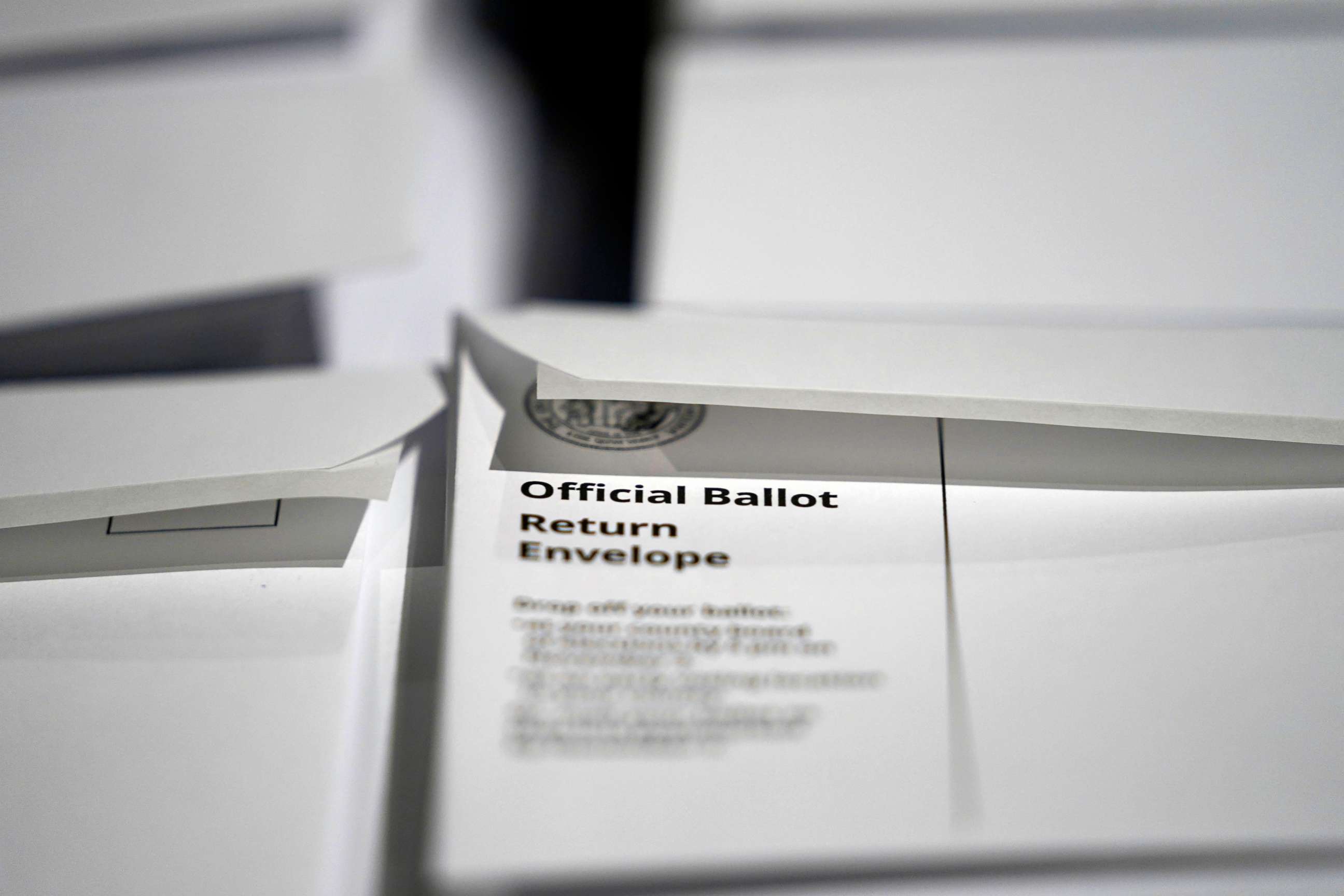 PHOTO: Stacks of ballot envelopes waiting to be mailed are seen at the Wake County Board of Elections in Raleigh, N.C.