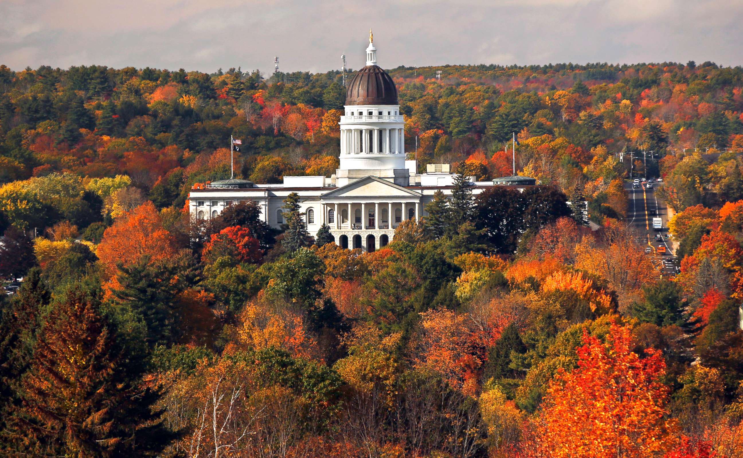 PHOTO: The State House is surrounded by fall foliage, Oct. 23, 2017, in Augusta, Maine. 