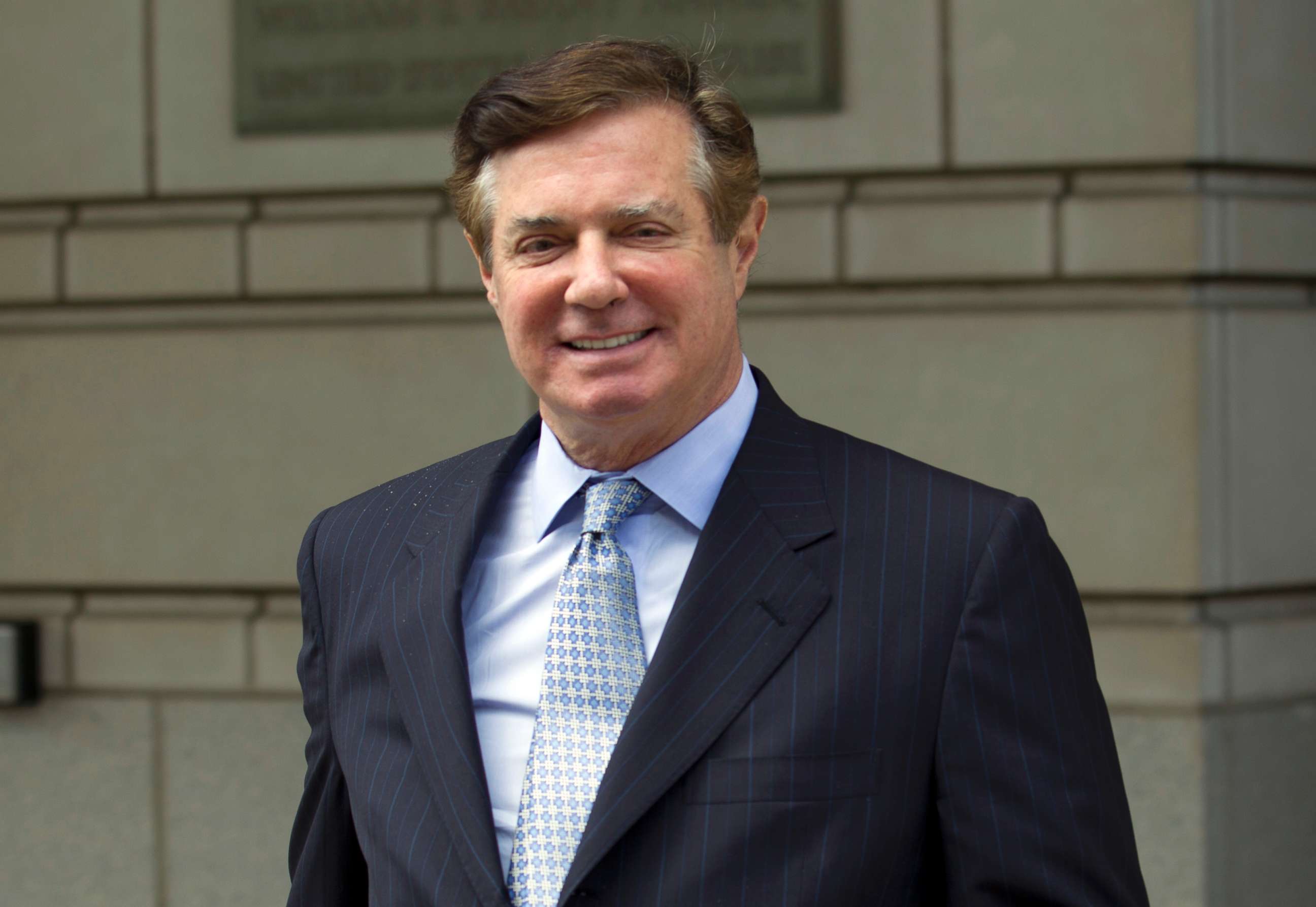 PHOTO: Paul Manafort, President Donald Trump's former campaign chairman, leaves the Federal District Court after a hearing, in Washington on May 23, 2018.