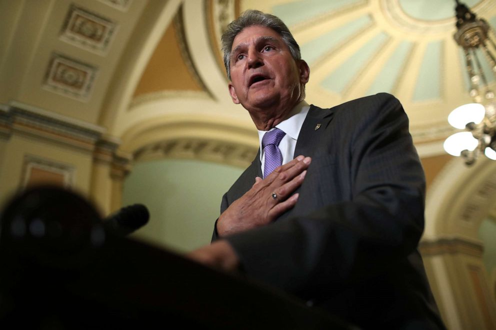 PHOTO: Sen. Joe Manchin answers questions at the U.S. Capitol  in Washington, DC.