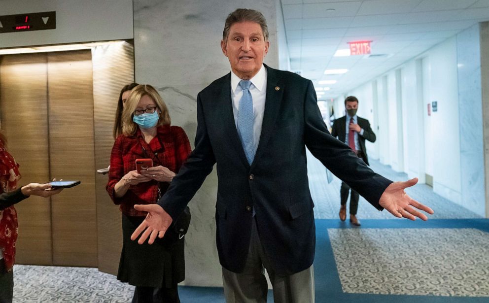 PHOTO: Sen. Joe Manchin leaves his office after speaking with President Joe Biden about his long-stalled domestic agenda, at the Capitol, Dec. 13, 2021, in Washington, D.C.
