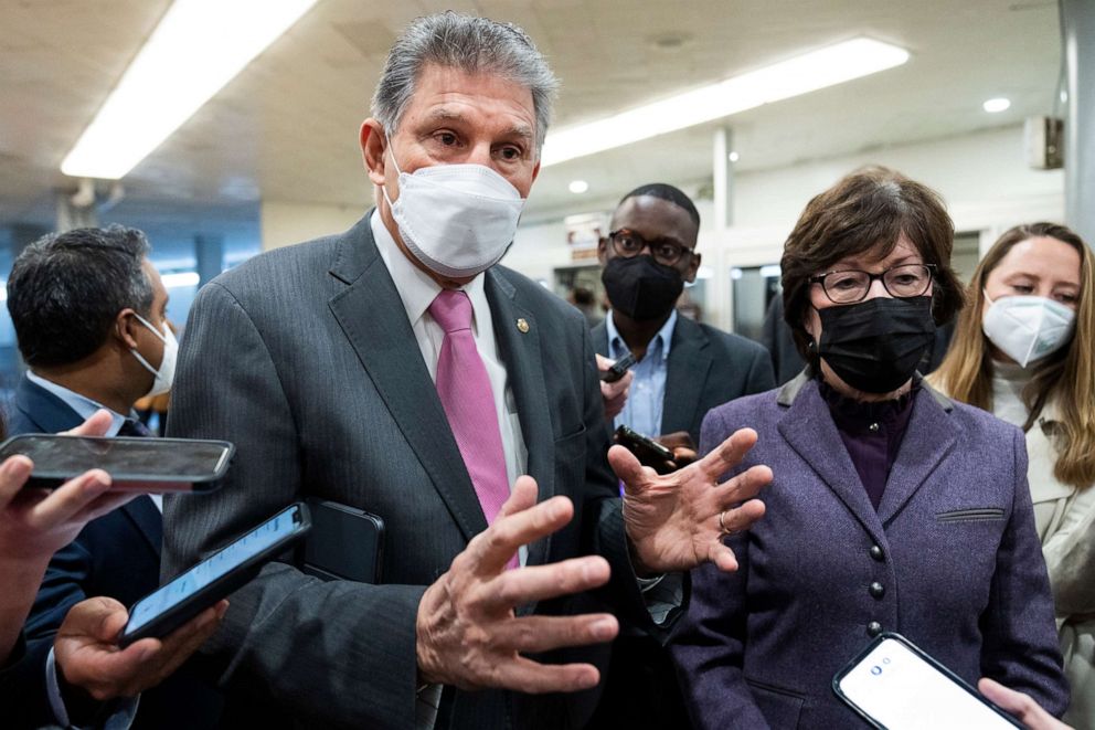 PHOTO: Sens. Joe Manchin and Susan Collins talk with reporters about voting rights at the Capitol, Jan. 20, 2022. 