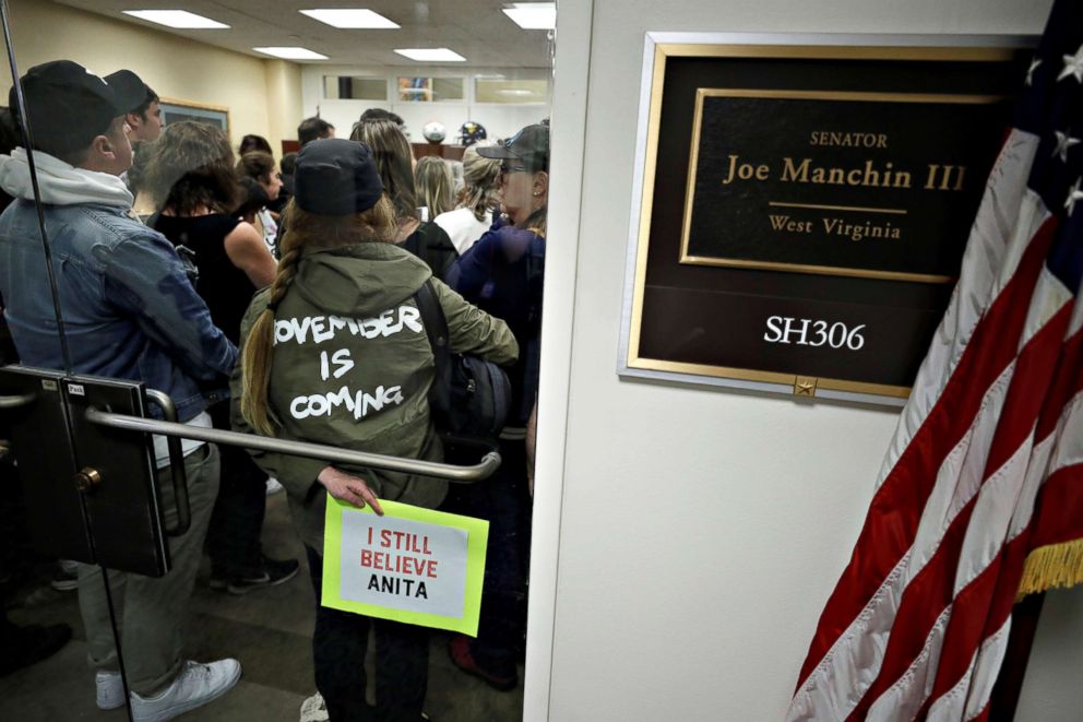 PHOTO: Demonstrators gather in the office of Sen. Joe Manchin (D-WV) following a procedural vote in the Senate on the confirmation of U.S. Supreme Court nominee Judge Brett Kavanaugh on Capitol Hill in Washington, Oct. 5, 2018.