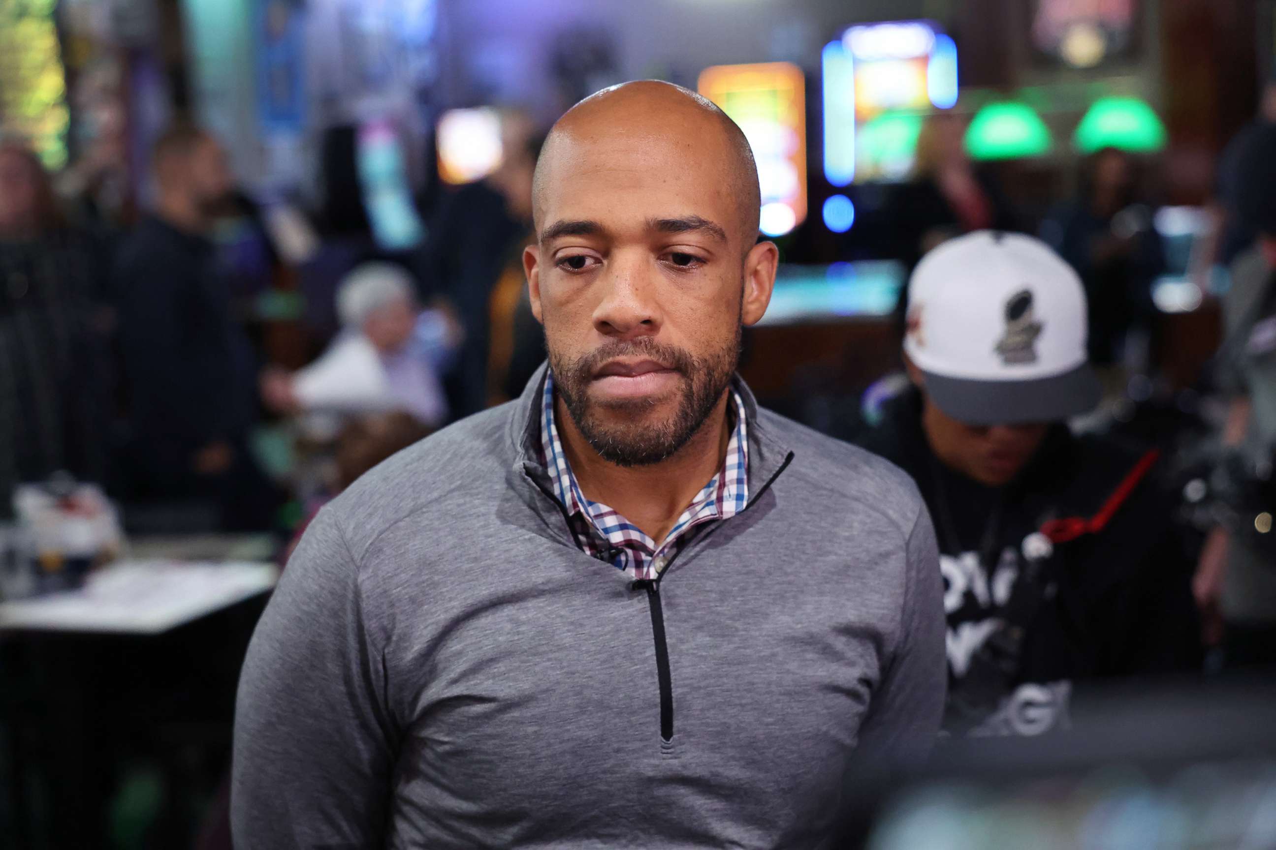 PHOTO: Democratic candidate for U.S. Senate in Wisconsin, Mandela Barnes speaks to reporters during a campaign stop at the Aris Sports Bar, Oct. 12, 2022, in West Allis, Wis. 